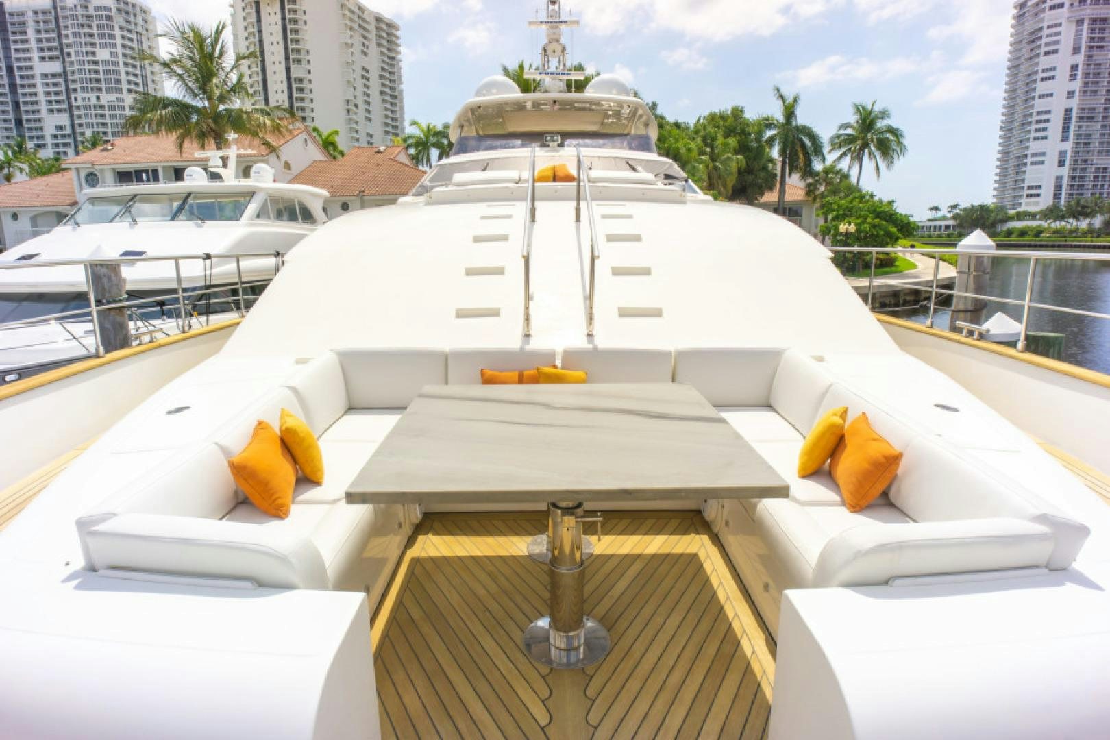 a large white building with a gold roof and a gold cross on top aboard ADAR Yacht for Sale