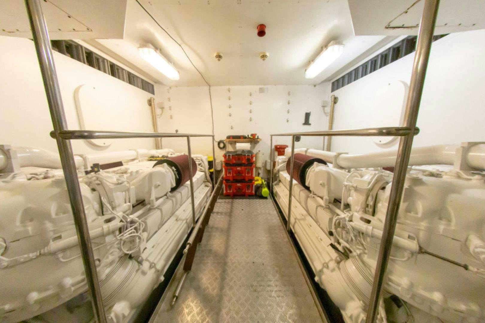 a room with white walls and pipes aboard ADAR Yacht for Sale