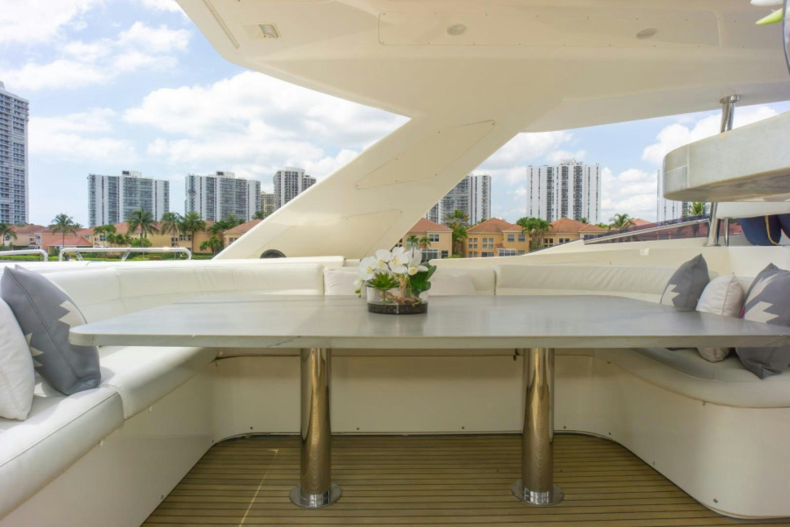 a table with a white tablecloth aboard ADAR Yacht for Sale