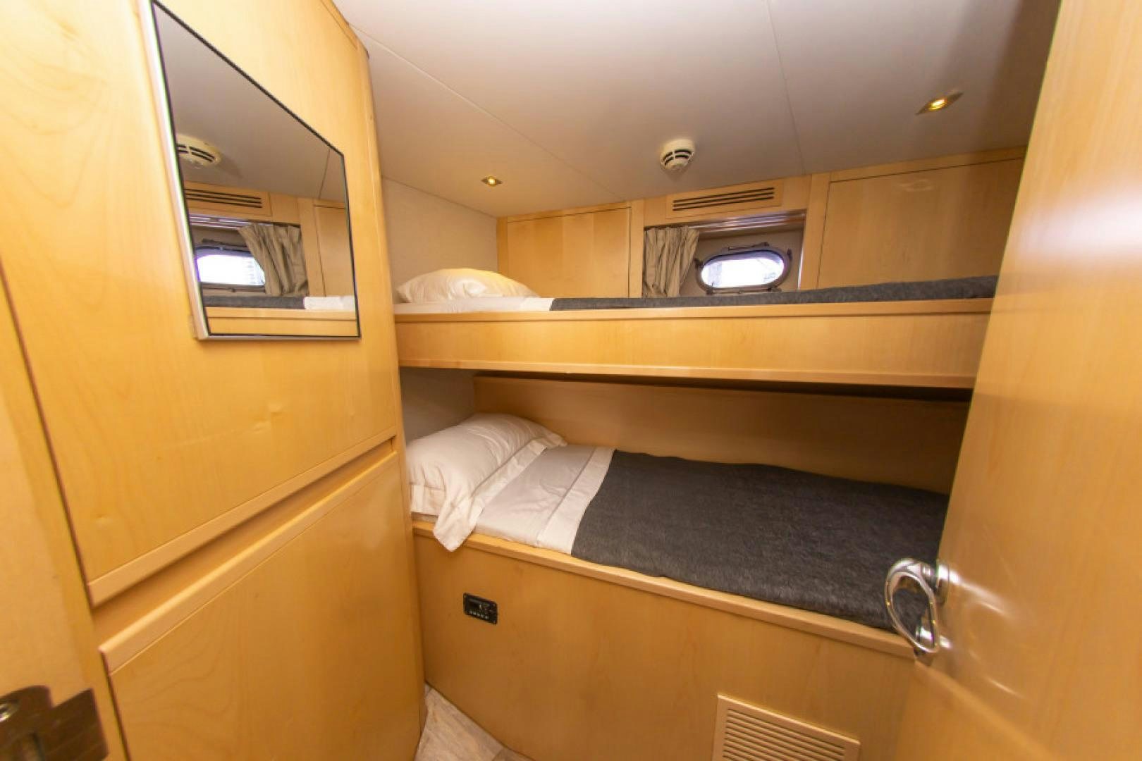 a bathroom with a tub and a mirror aboard ADAR Yacht for Sale