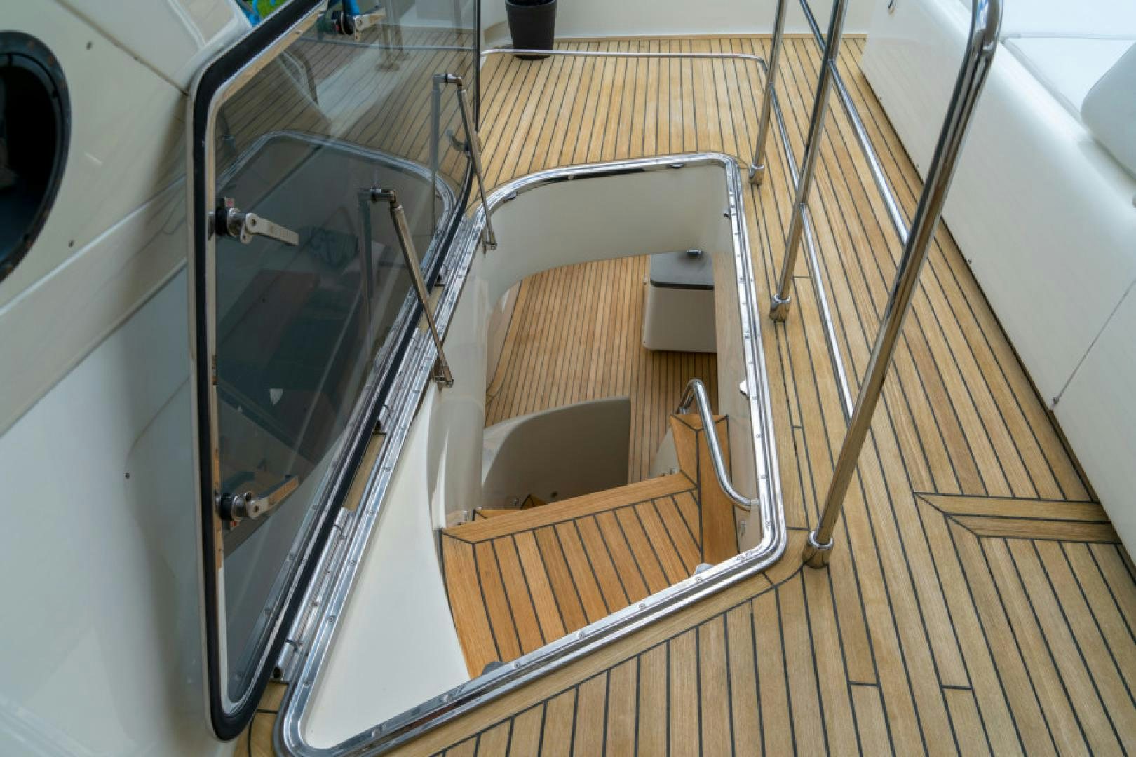 a set of metal stairs aboard ADAR Yacht for Sale