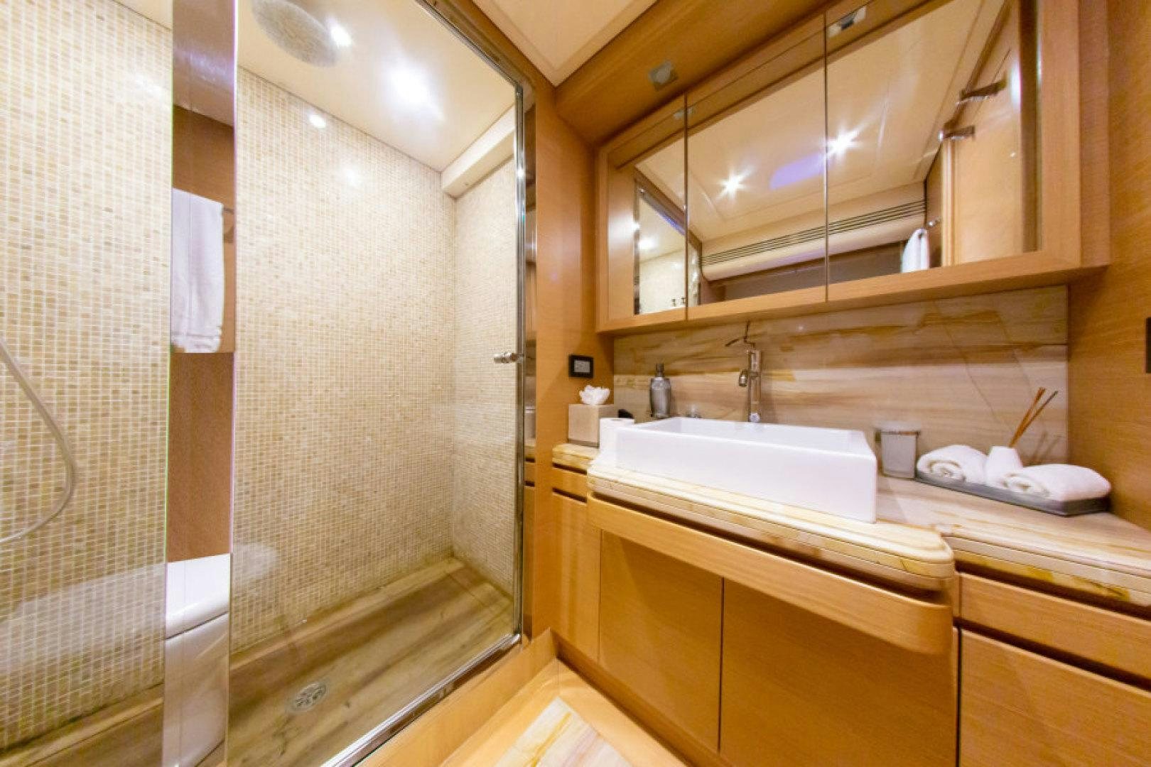 a bathroom with a sink and a shower aboard ADAR Yacht for Sale