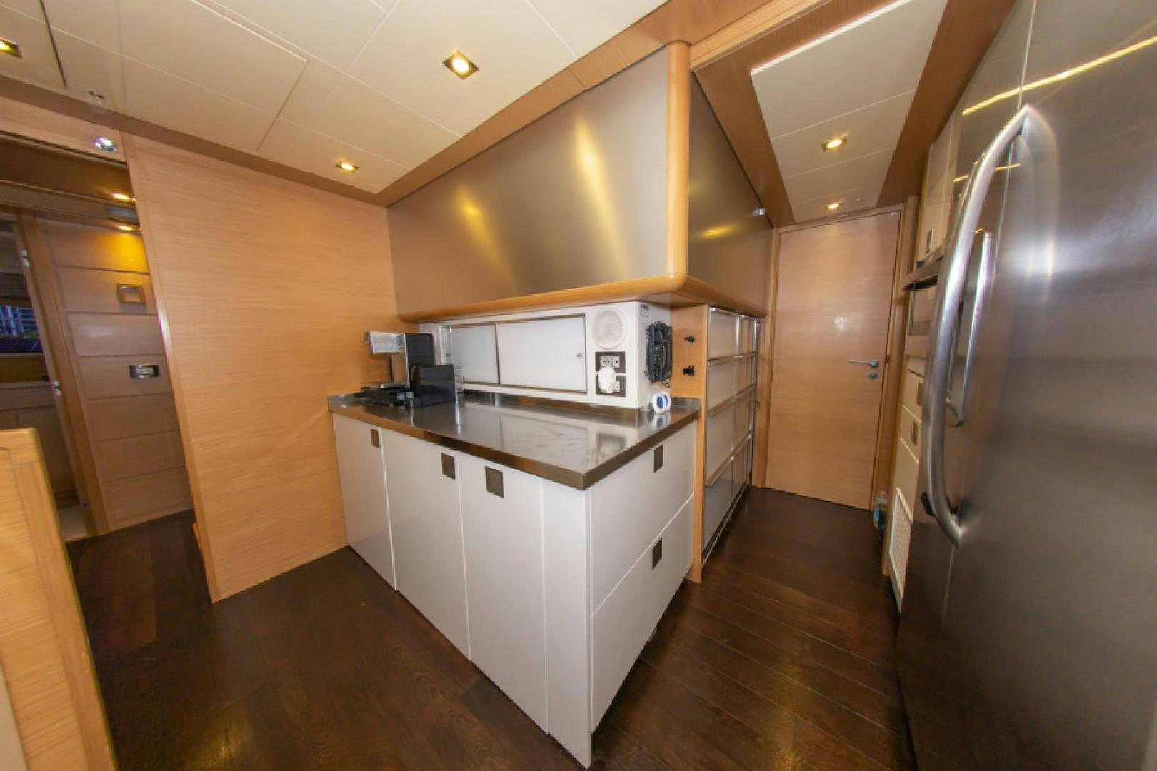 a kitchen with a large island aboard ADAR Yacht for Sale