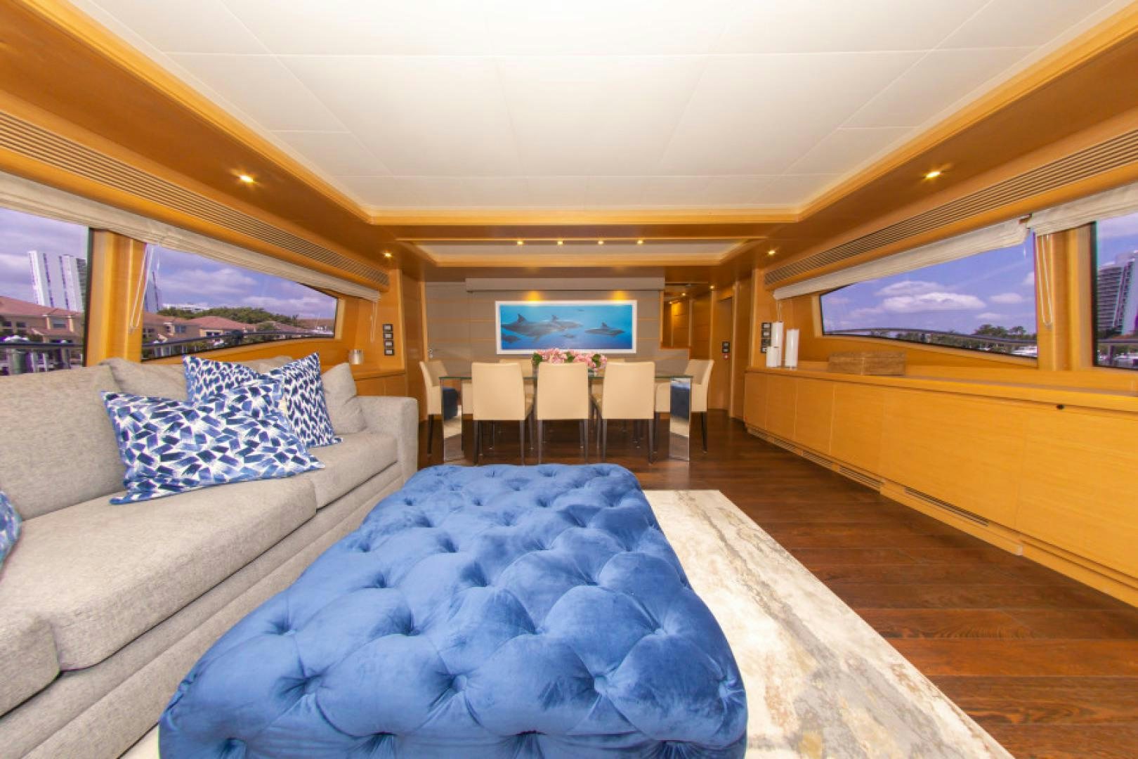 a room with a bed and a couch aboard ADAR Yacht for Sale