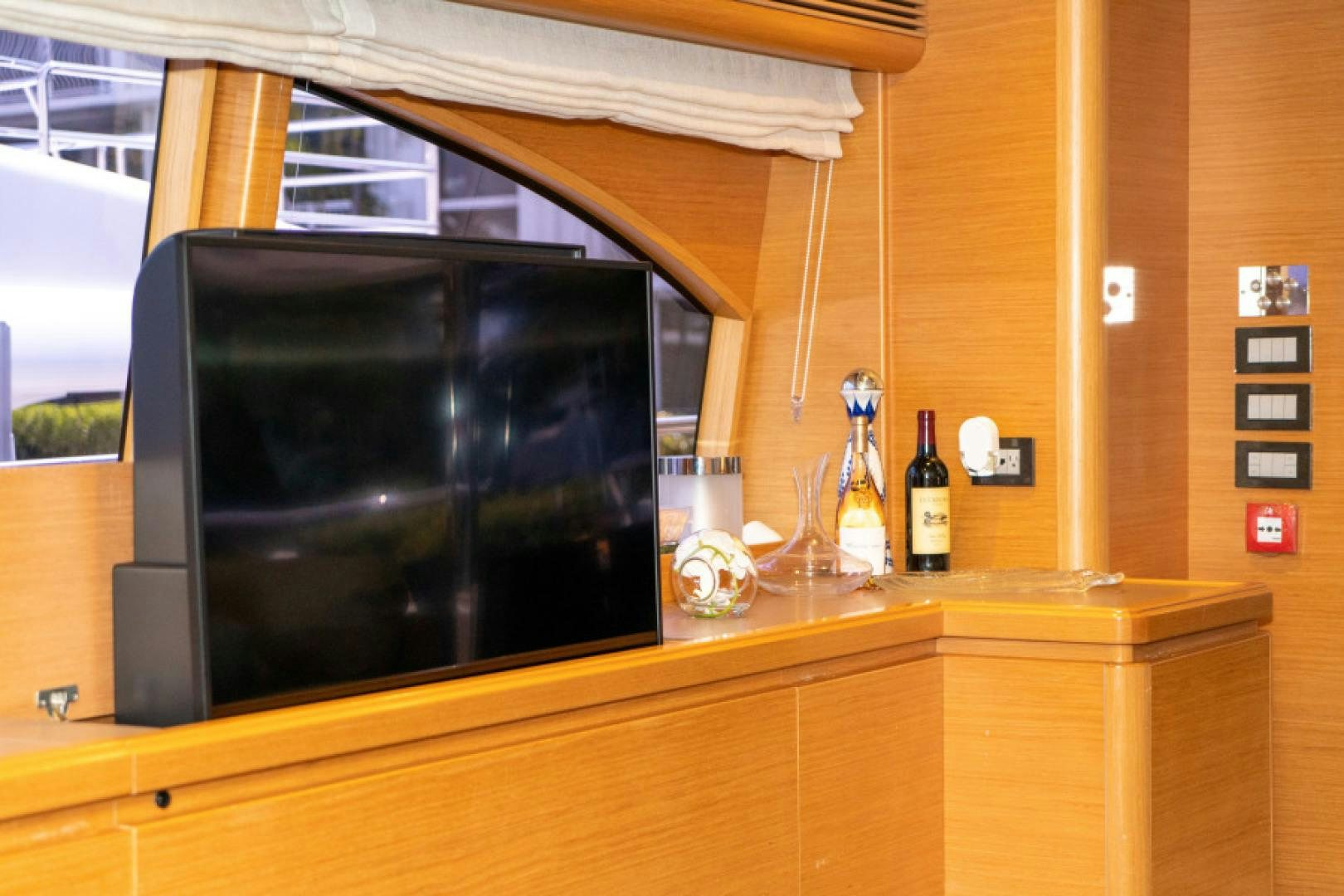 a tv on a counter aboard ADAR Yacht for Sale