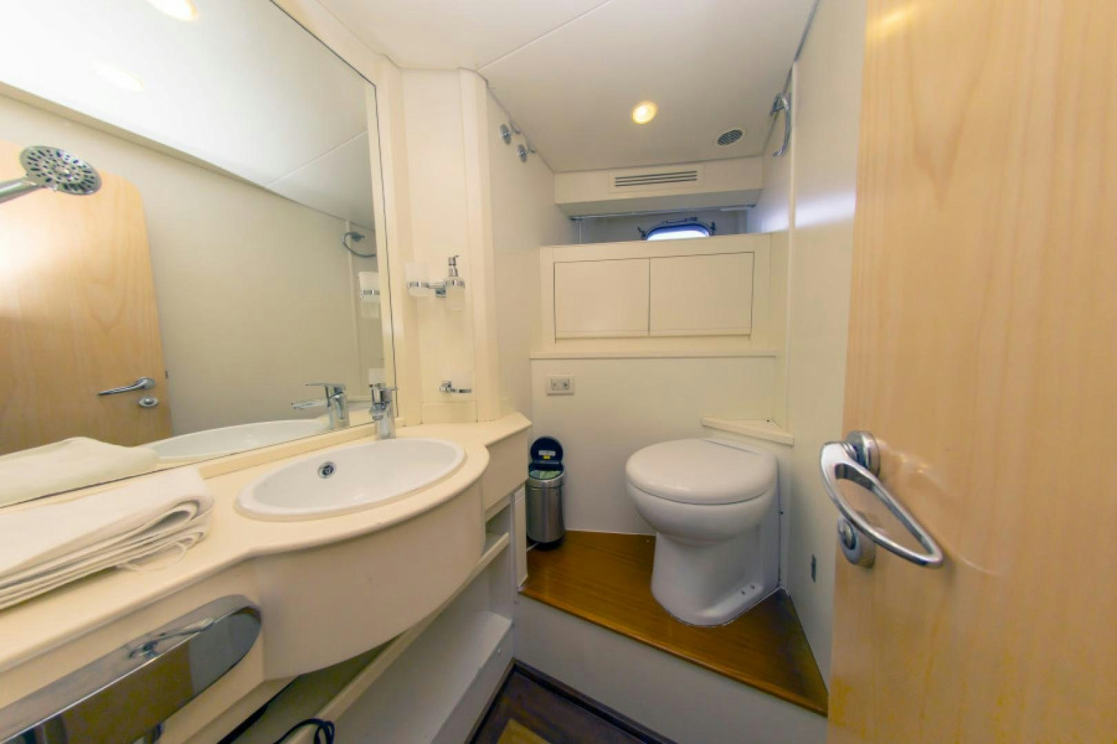 a bathroom with a toilet and sink aboard ADAR Yacht for Sale