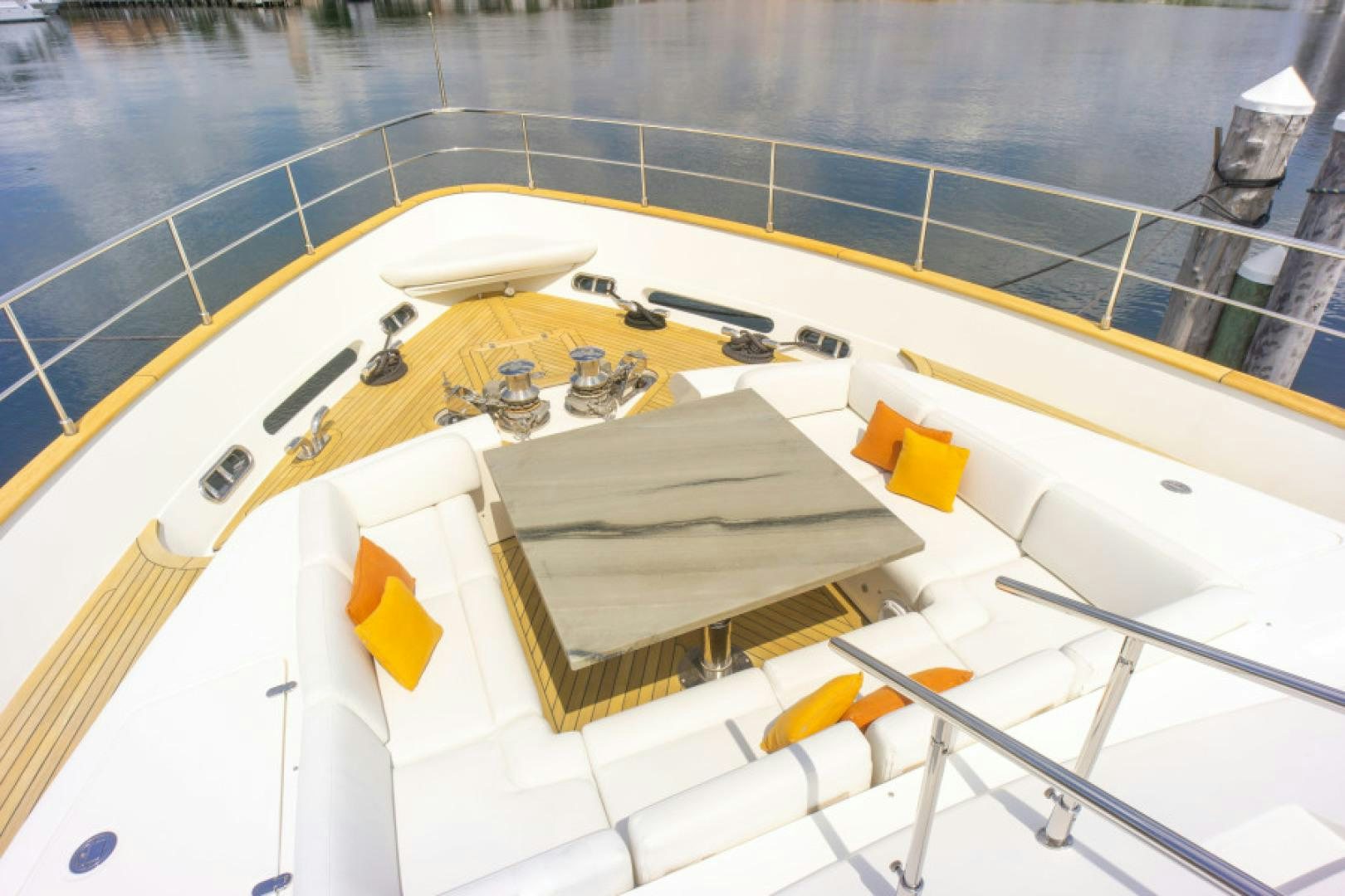 a boat with a seat aboard ADAR Yacht for Sale