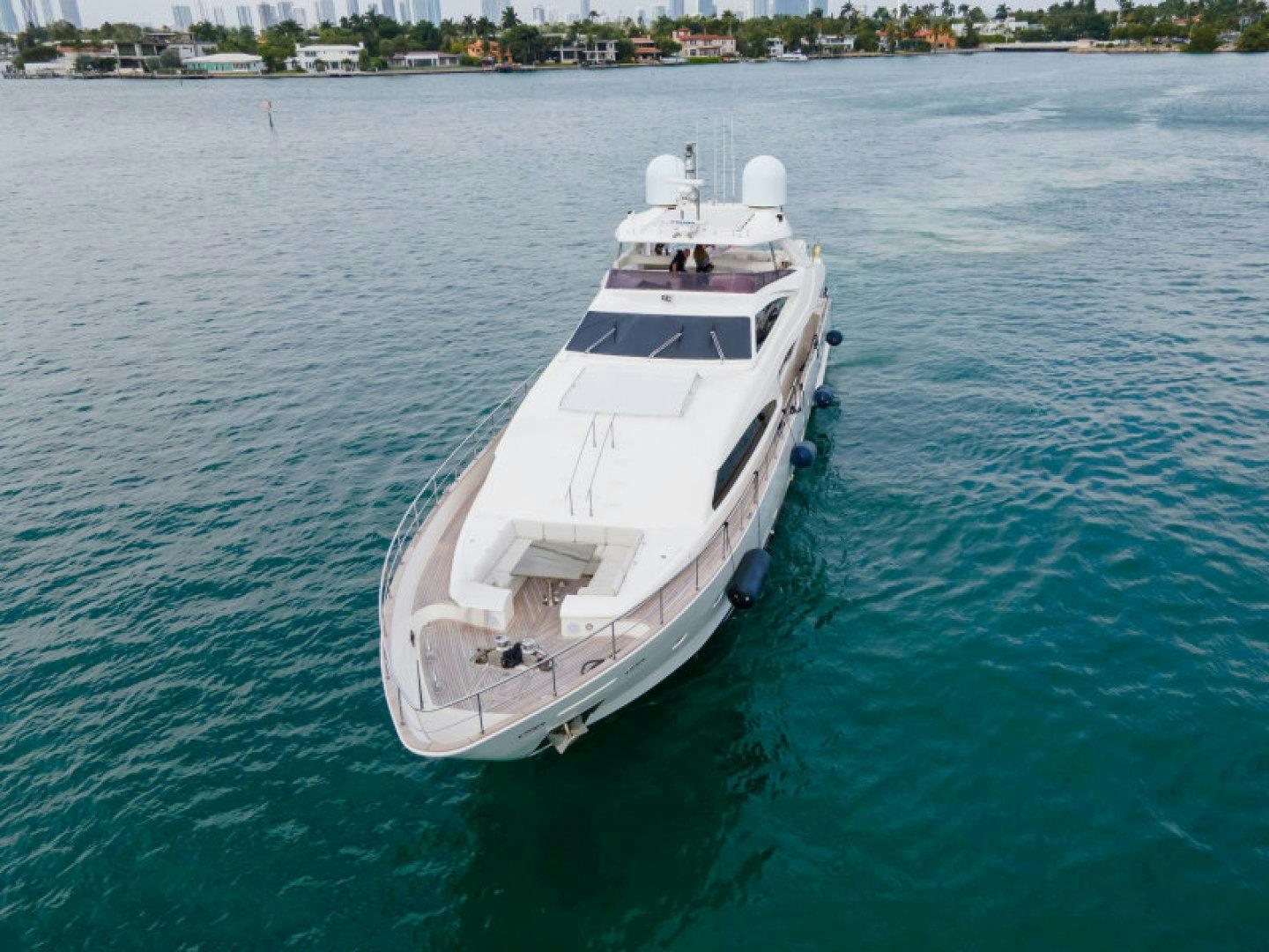 a white boat in the water aboard ADAR Yacht for Sale