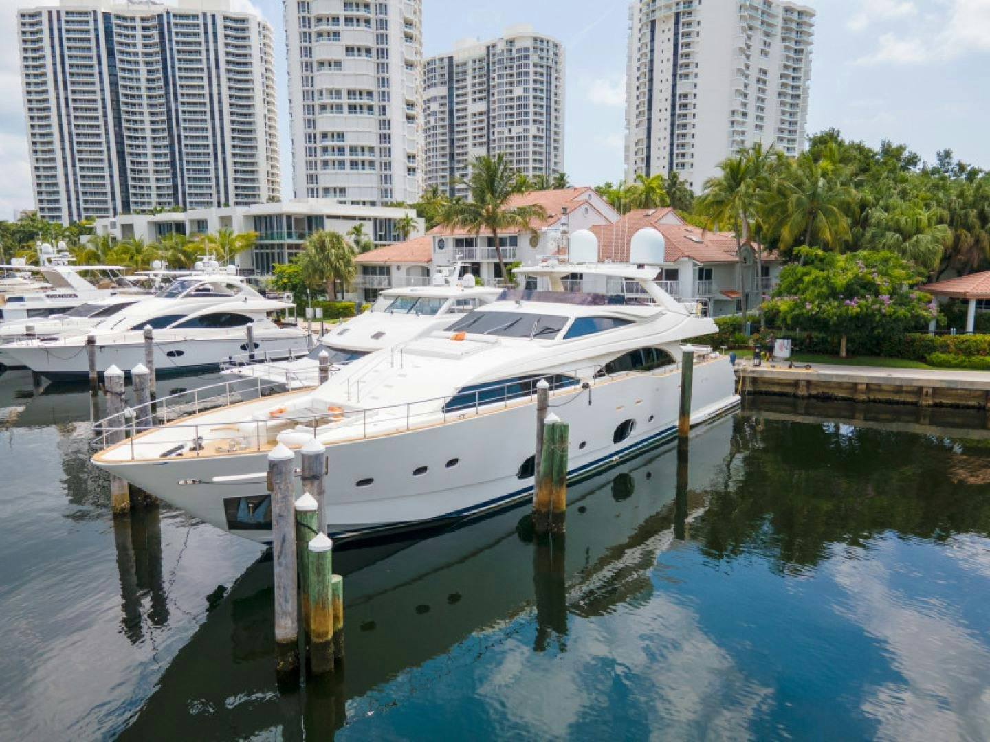 a group of boats are parked in a harbor aboard ADAR Yacht for Sale
