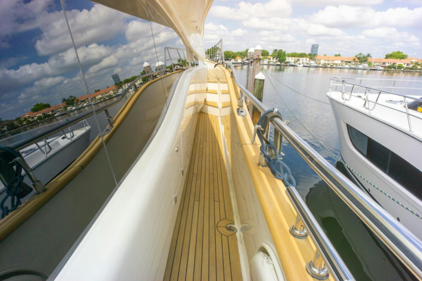 a row of boats on a dock aboard ADAR Yacht for Sale
