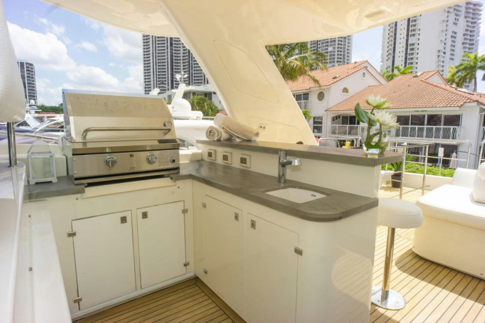 a kitchen with a large window aboard ADAR Yacht for Sale