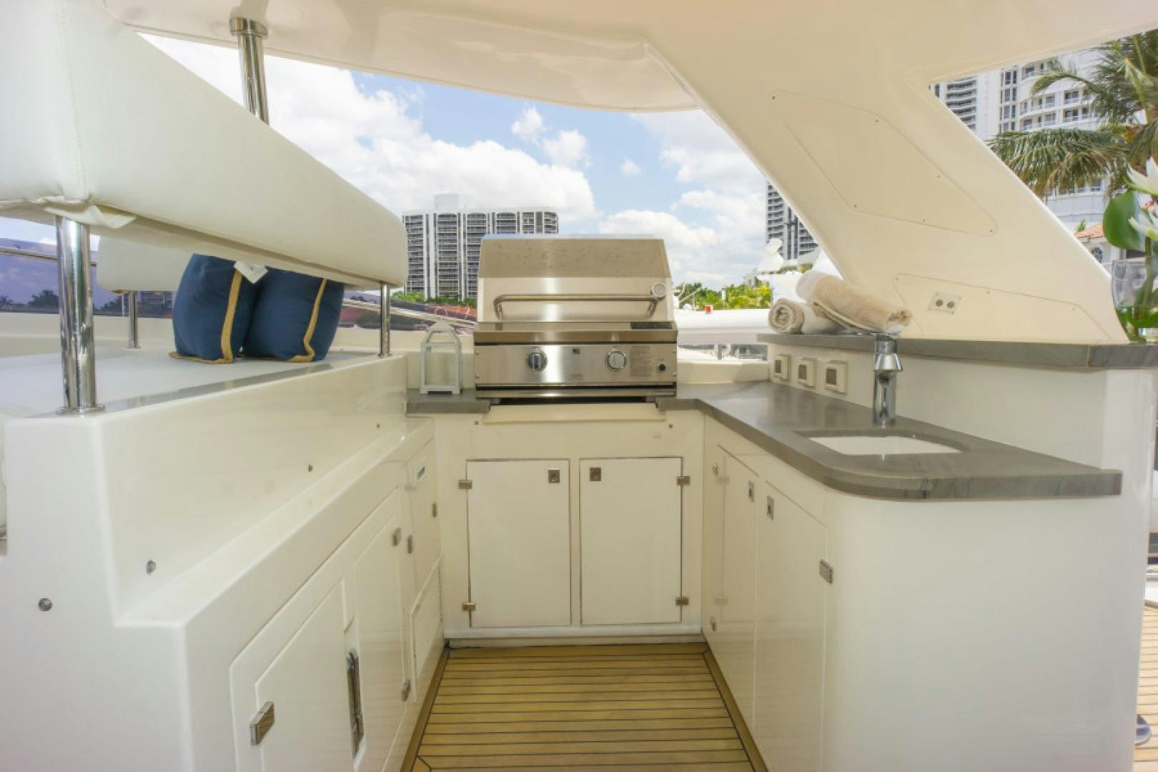 a kitchen with a large window aboard ADAR Yacht for Sale