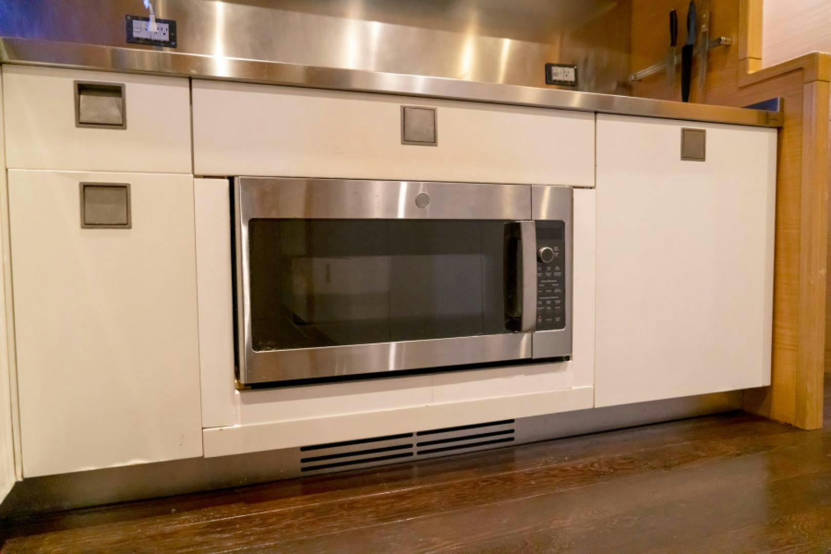 a silver oven in a kitchen aboard ADAR Yacht for Sale