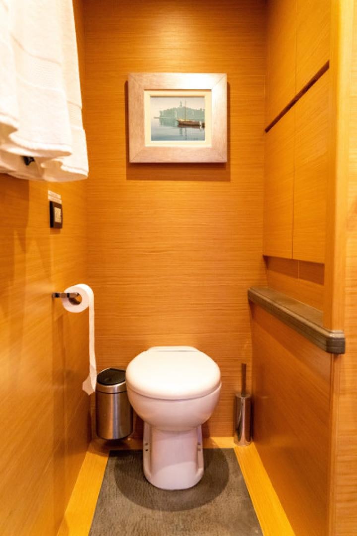 a toilet in a bathroom aboard ADAR Yacht for Sale