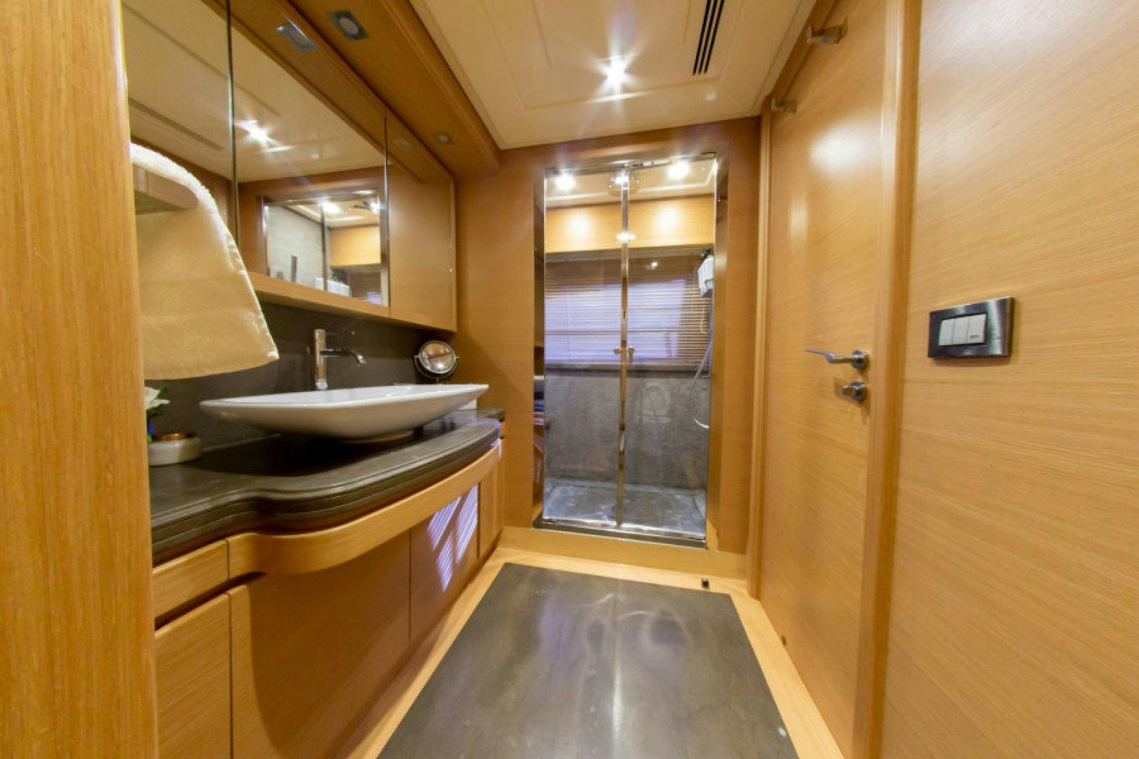 a bathroom with a sink and a mirror aboard ADAR Yacht for Sale