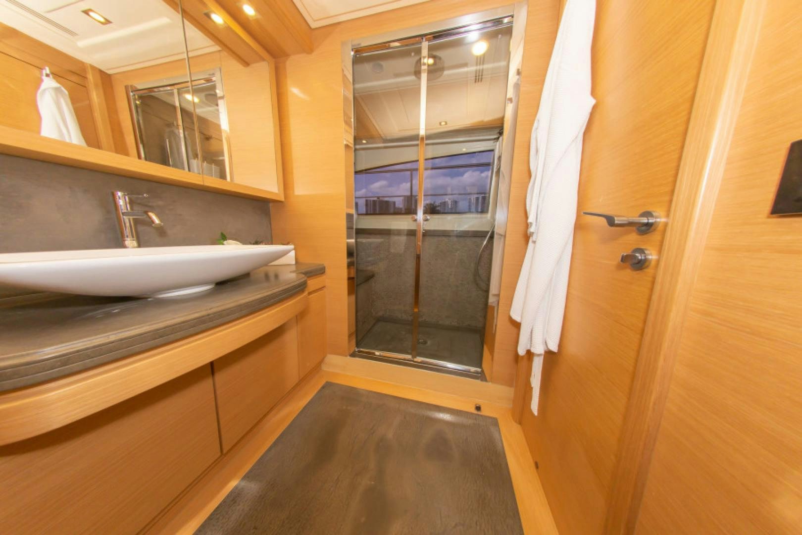 a bathroom with a sink and a mirror aboard ADAR Yacht for Sale