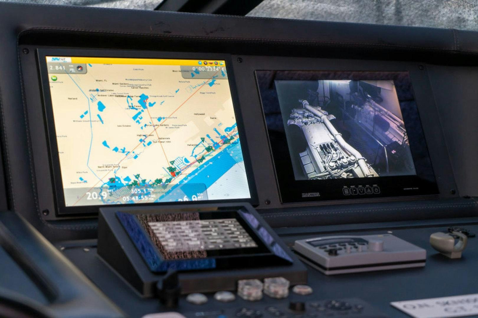 a computer monitor and keyboard aboard ADAR Yacht for Sale
