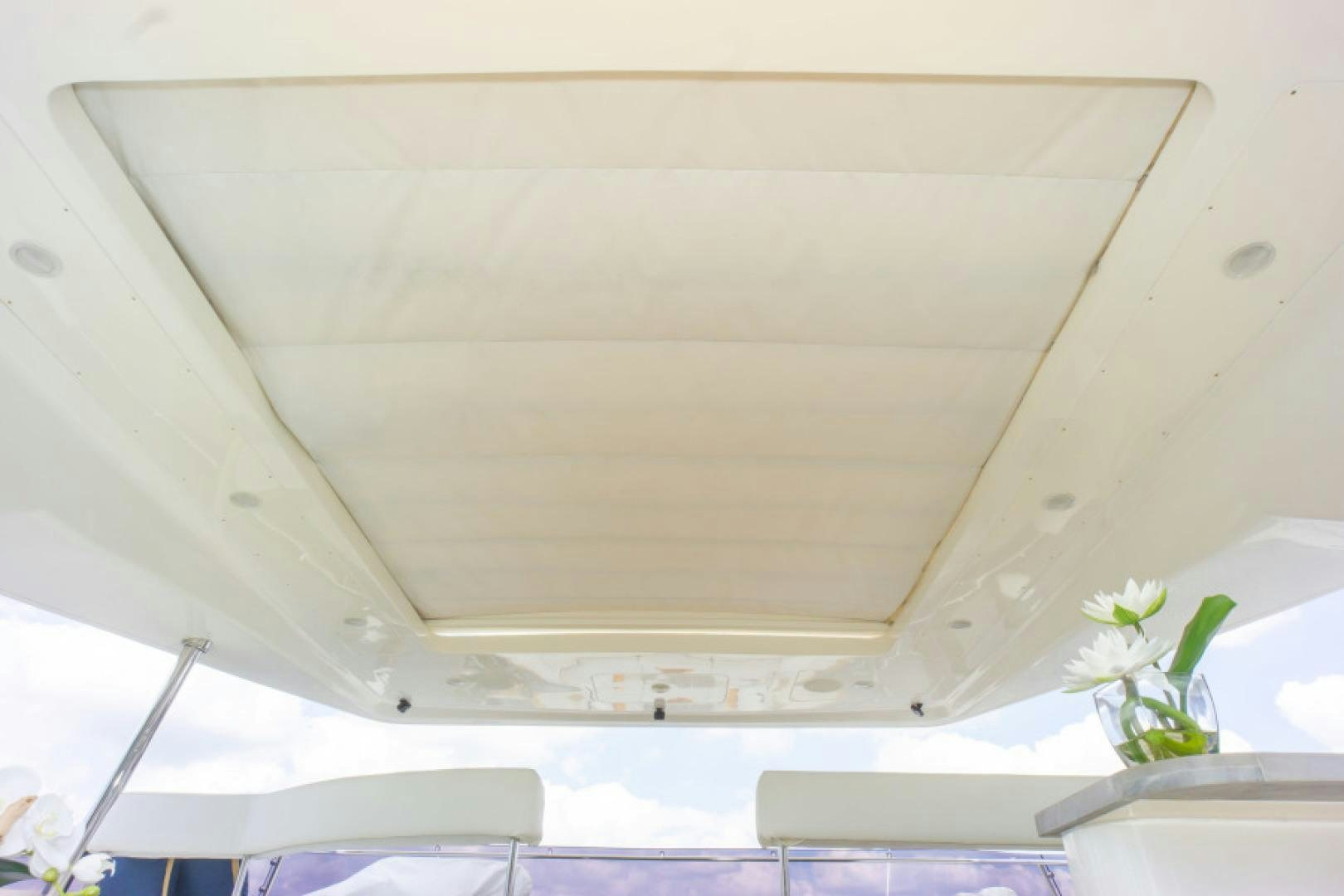 a plant in a pot on a white ceiling aboard ADAR Yacht for Sale