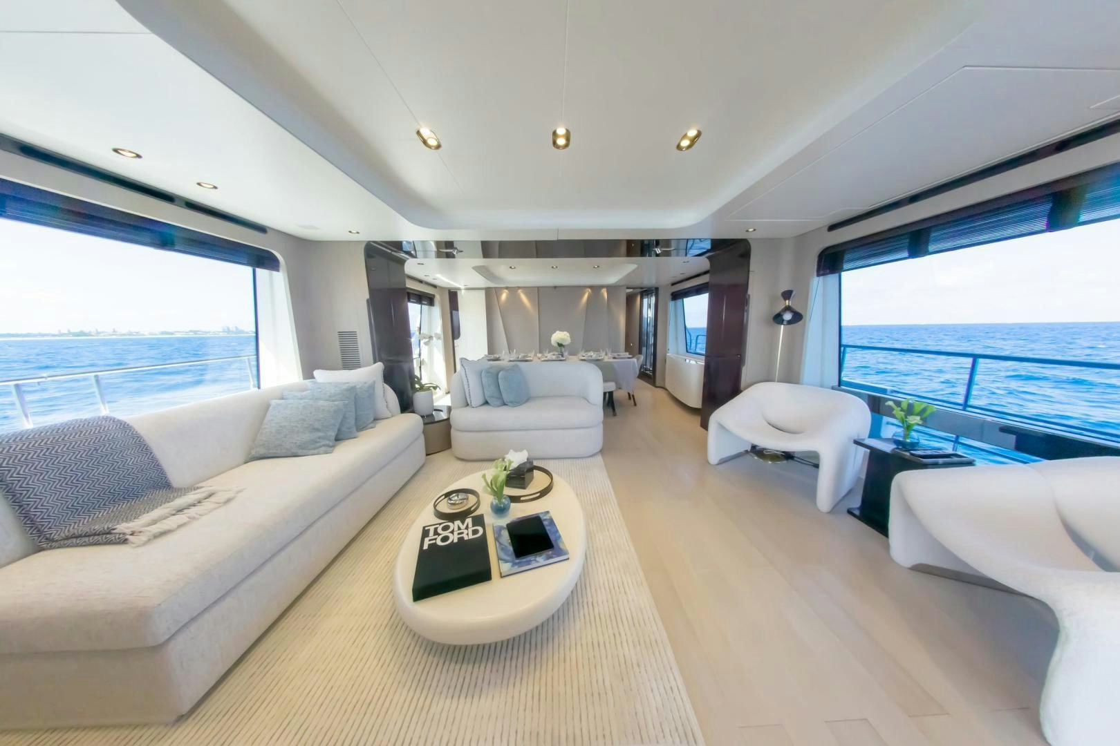 a living room with a large window aboard RINA Yacht for Sale