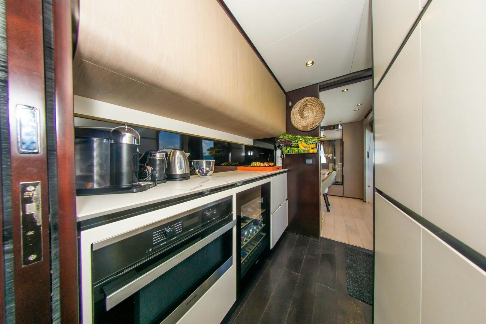 a kitchen with stainless steel appliances aboard RINA Yacht for Sale