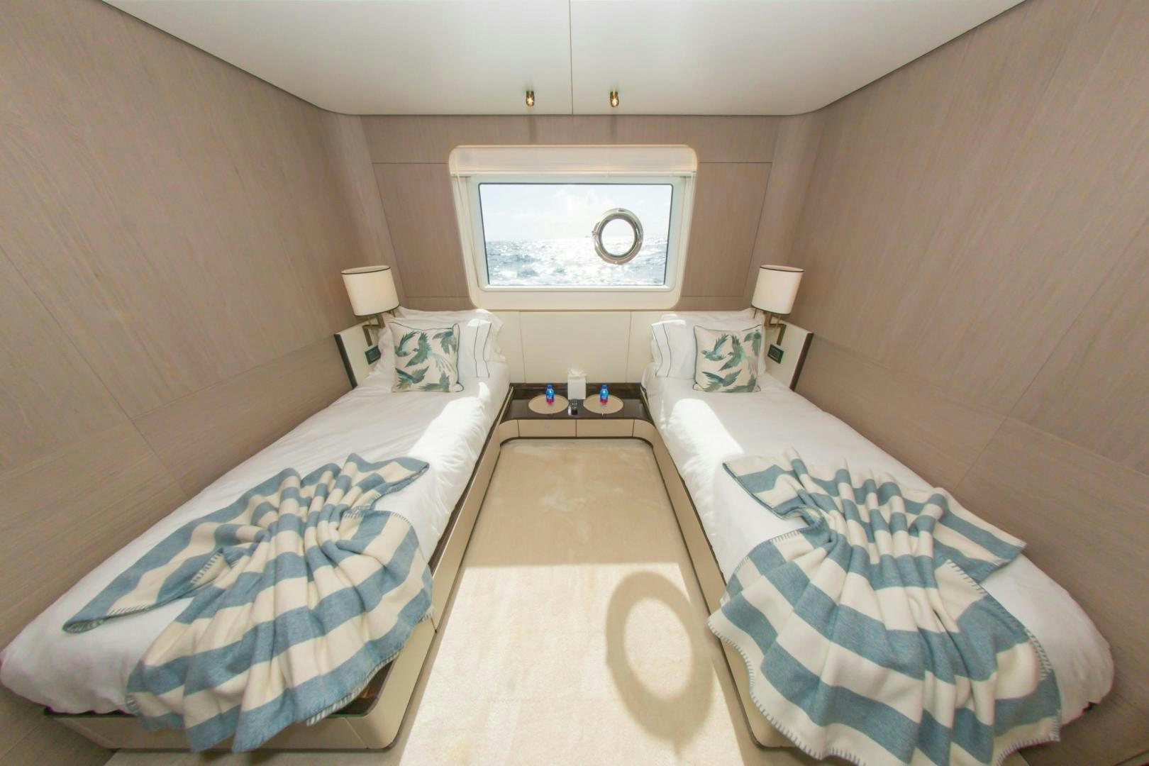 a couple of beds in a room aboard RINA Yacht for Sale