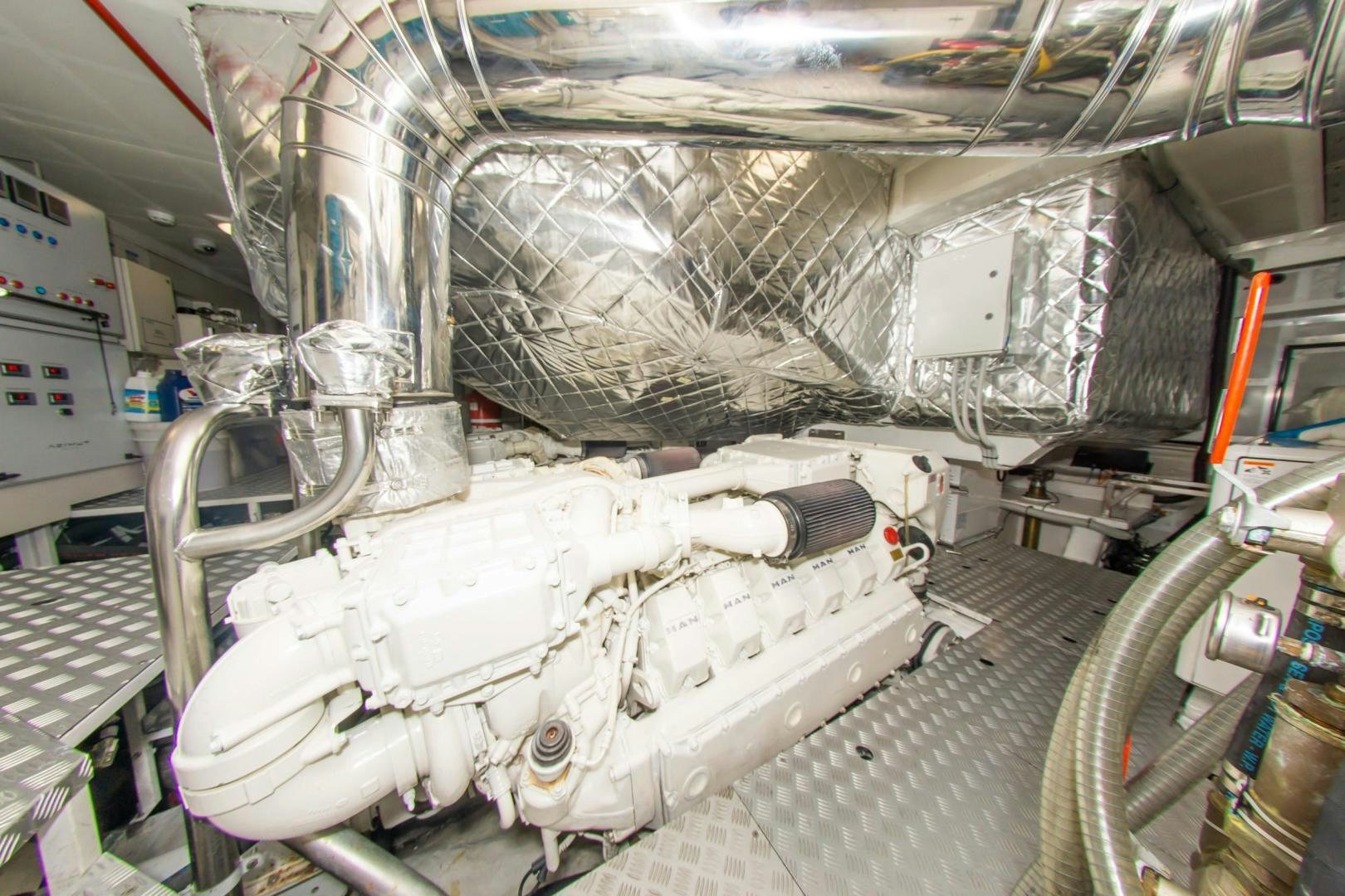 a large white machine aboard RINA Yacht for Sale