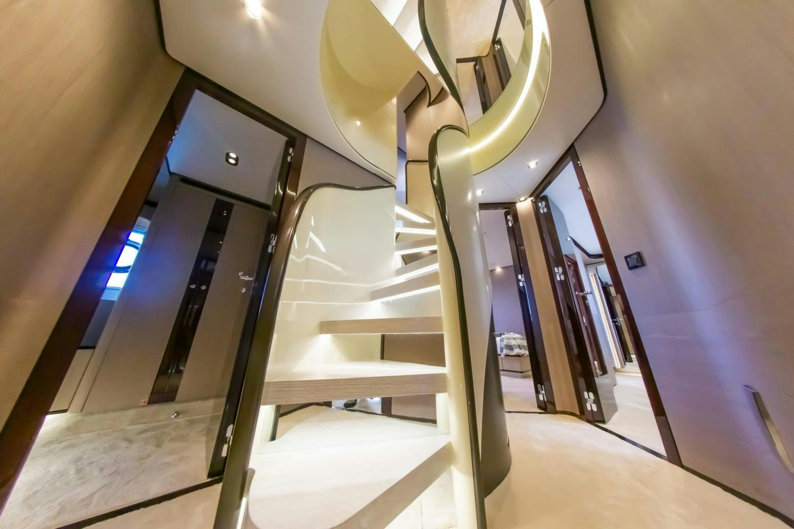 a staircase with a light aboard RINA Yacht for Sale