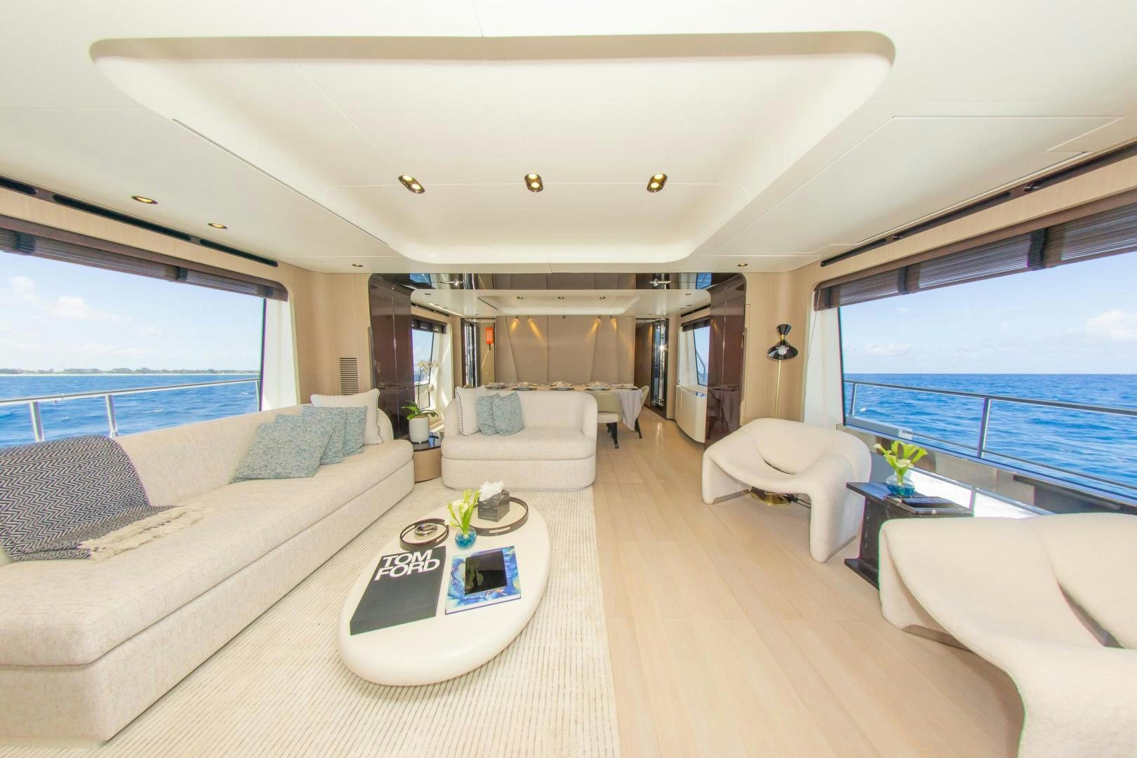a living room with a large window aboard RINA Yacht for Sale