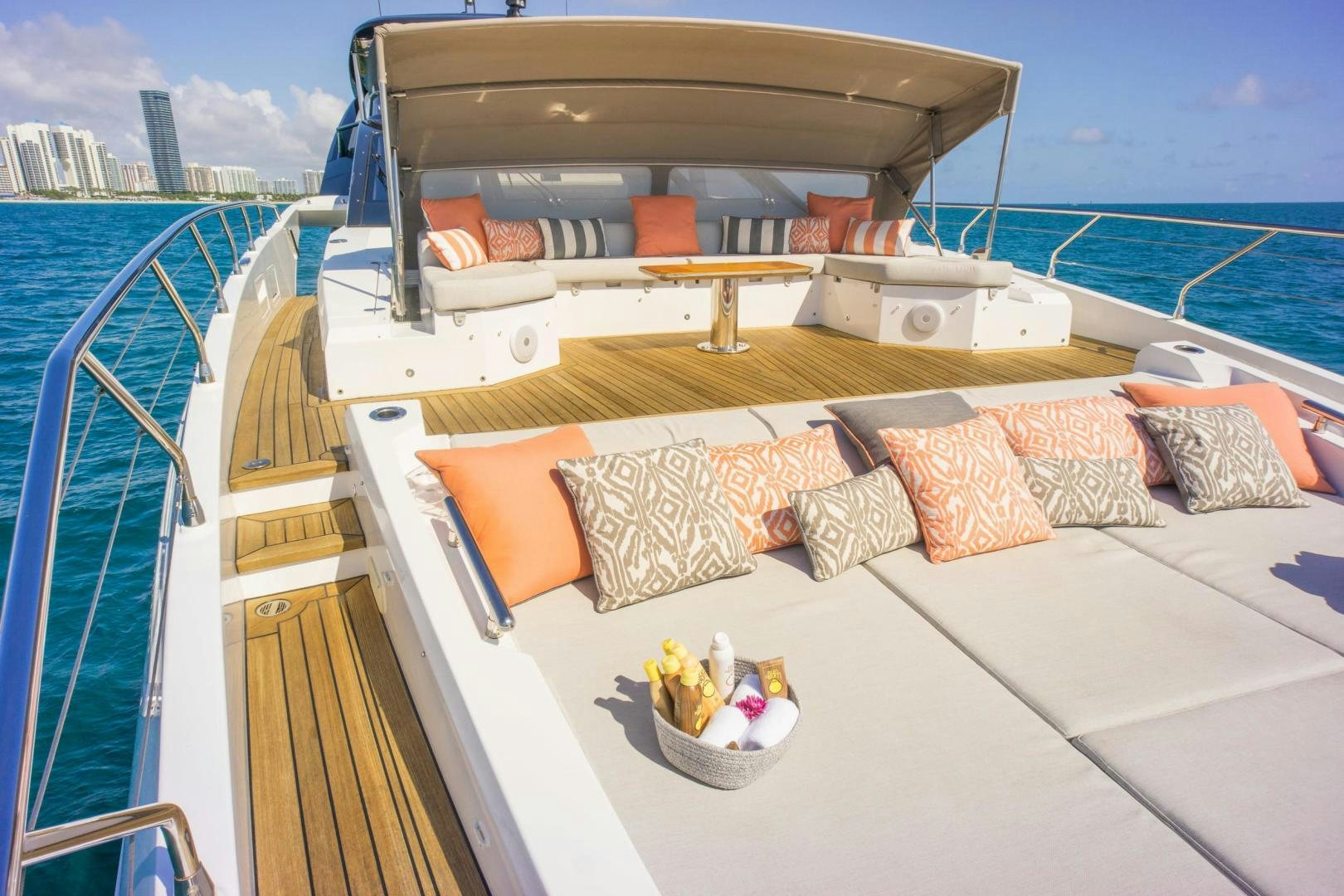 a boat with pillows and a basket of fruit on a boat aboard RINA Yacht for Sale