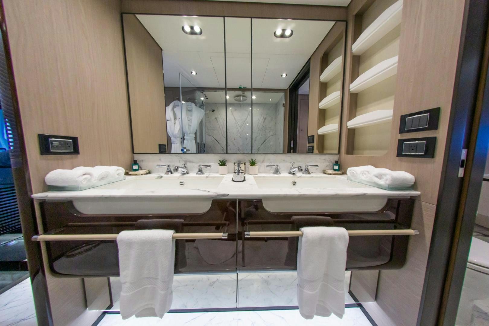 a bathroom with a large mirror aboard RINA Yacht for Sale