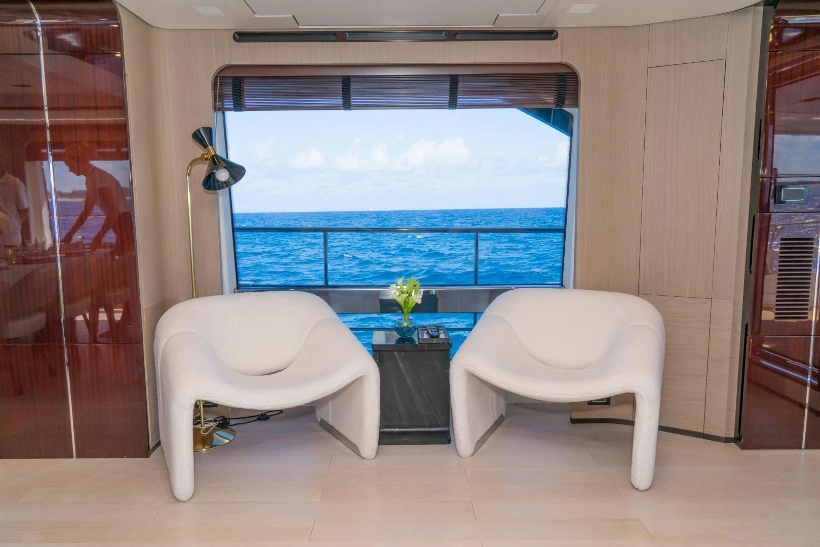 a white couch in a room aboard RINA Yacht for Sale