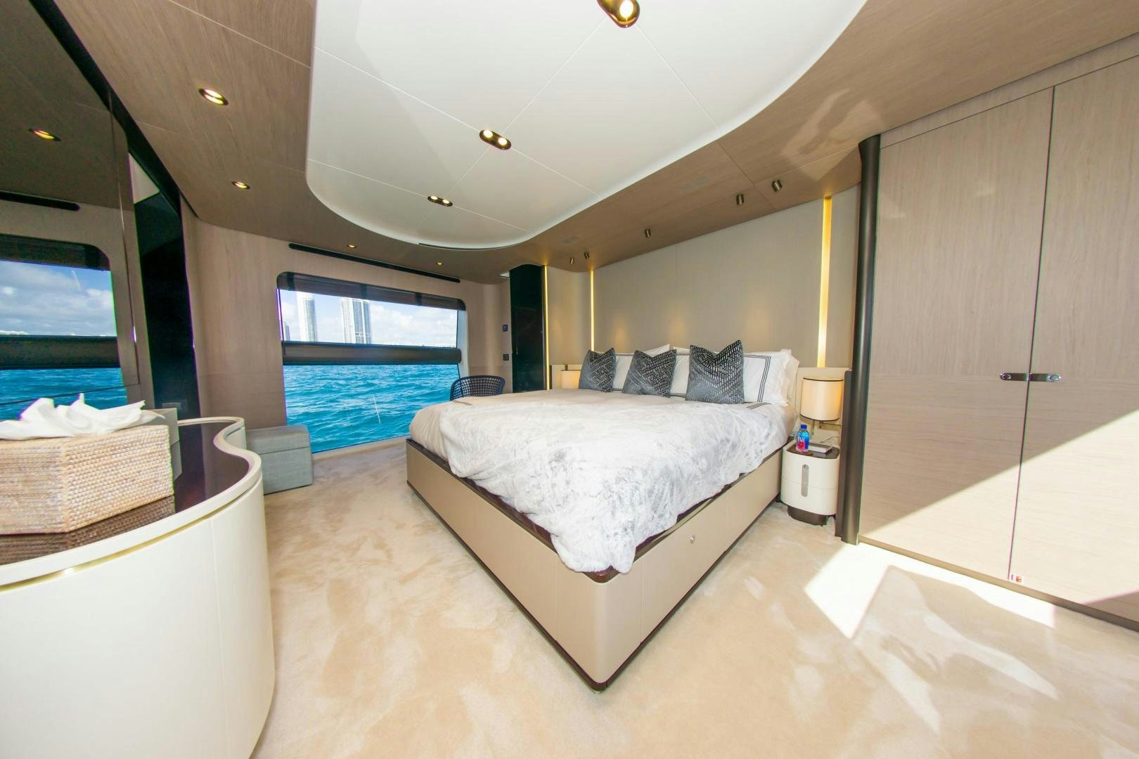 a bedroom with a large bed aboard RINA Yacht for Sale