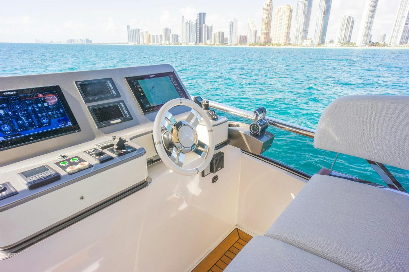 a boat with a steering wheel aboard RINA Yacht for Sale