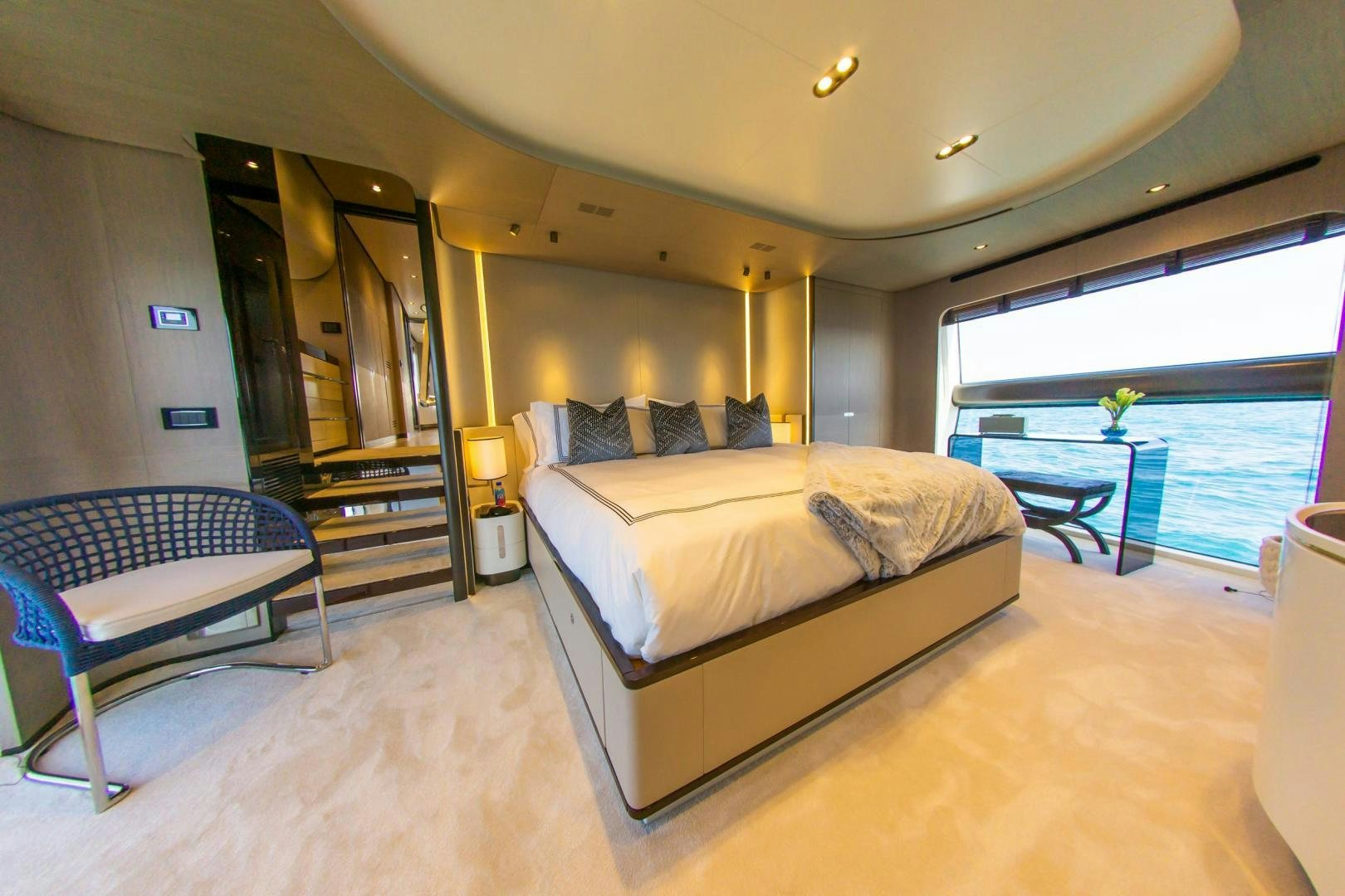 a bedroom with a large bed aboard RINA Yacht for Sale