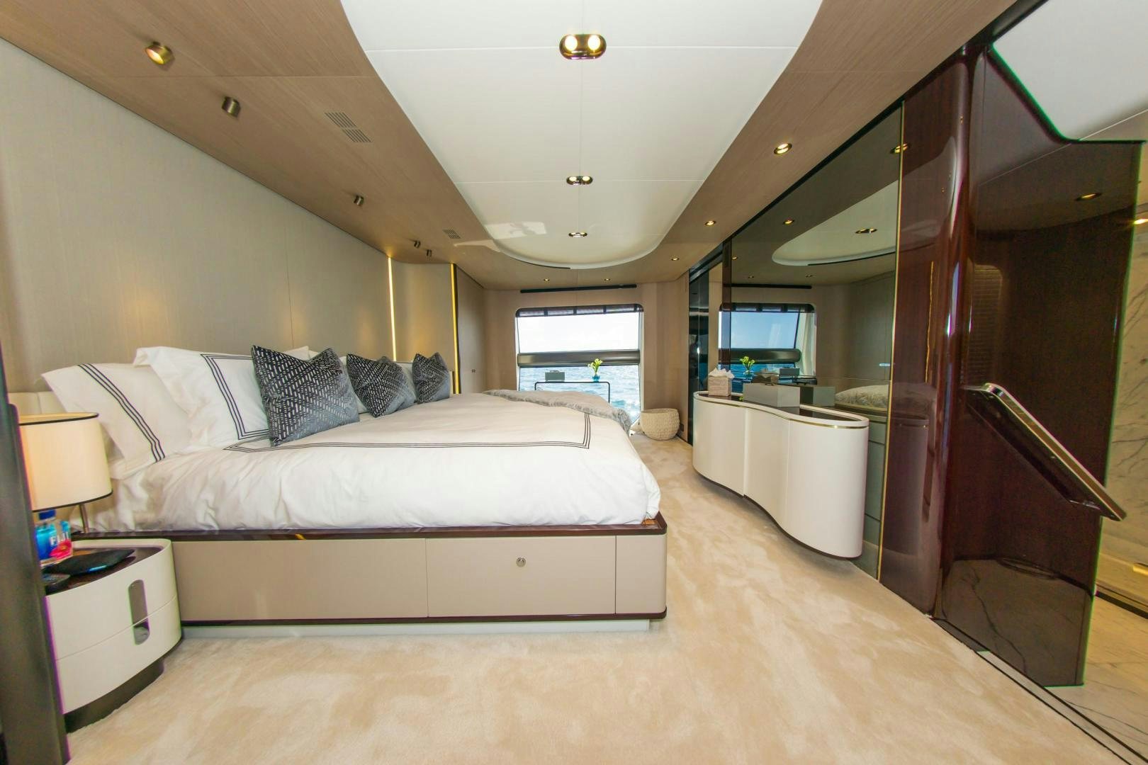 a bedroom with a bed and a tv aboard RINA Yacht for Sale