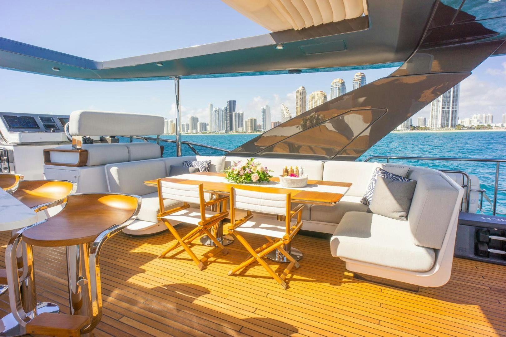 a room with a table and chairs aboard RINA Yacht for Sale