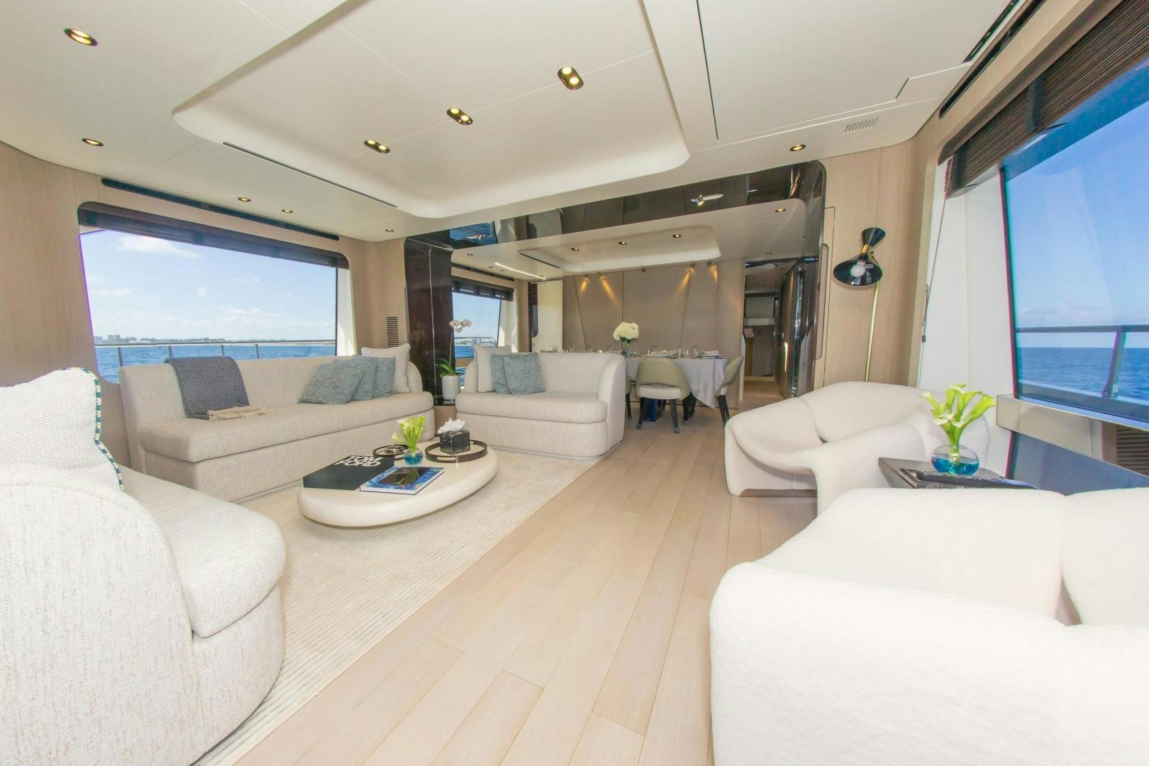 a living room with a large window aboard RINA Yacht for Sale