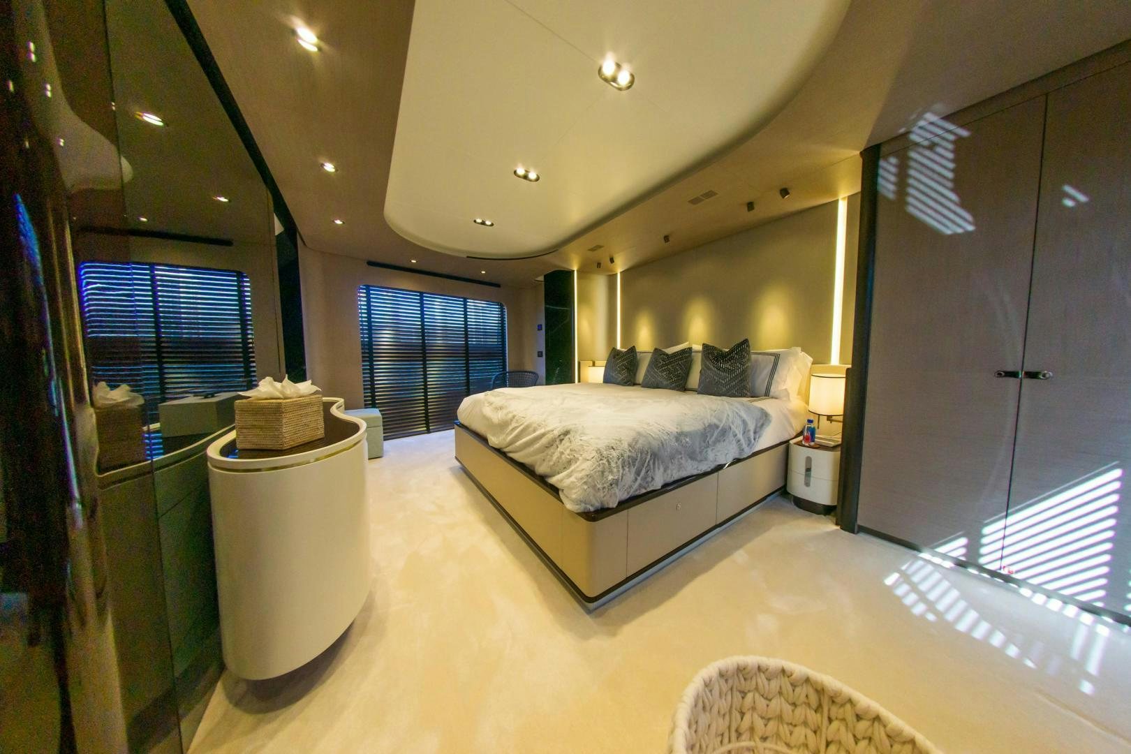 a large bedroom with a large bed aboard RINA Yacht for Sale