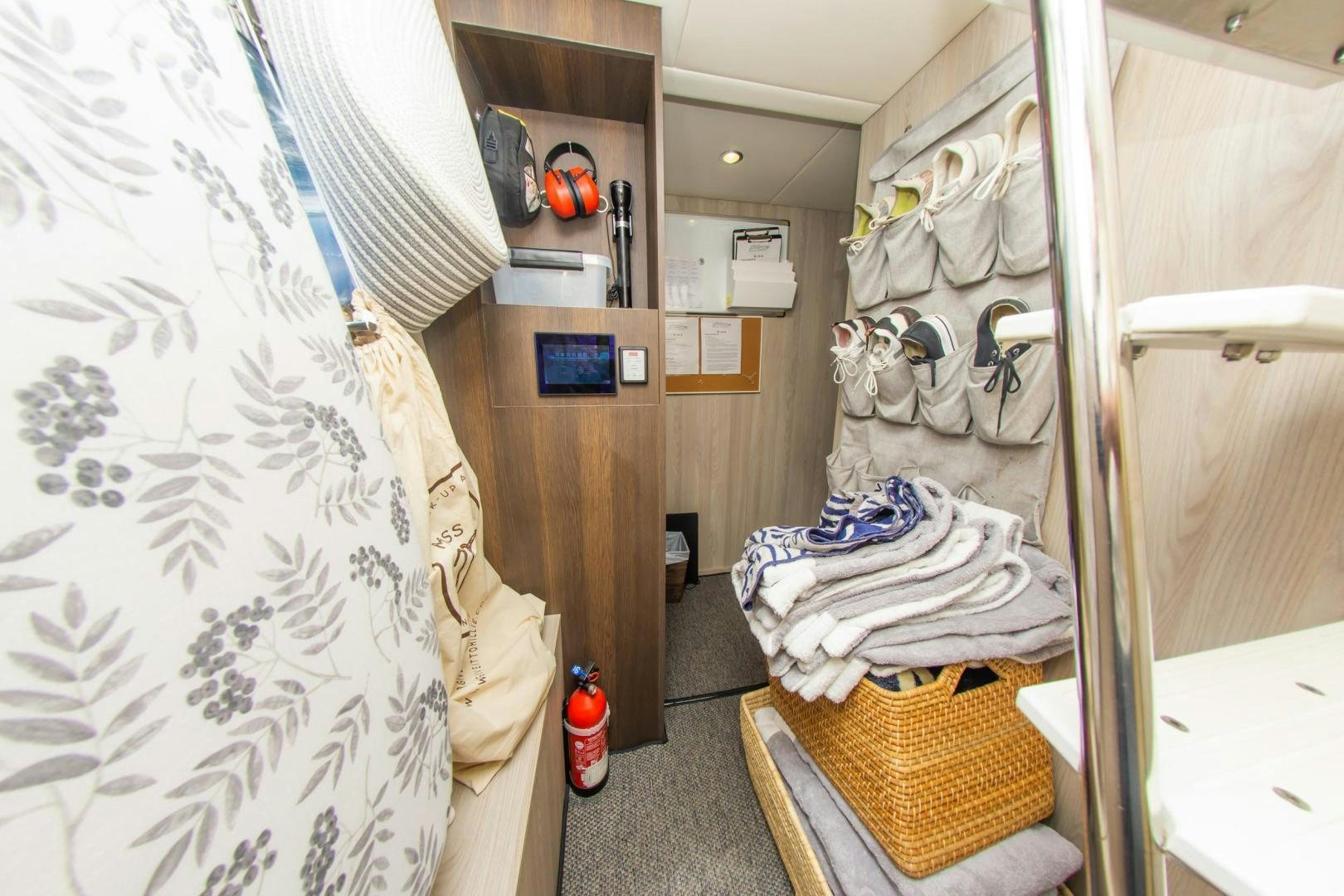 a room with a bed and a sink aboard RINA Yacht for Sale