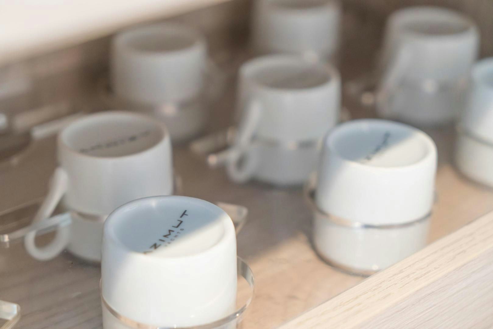 a group of coffee cups aboard RINA Yacht for Sale