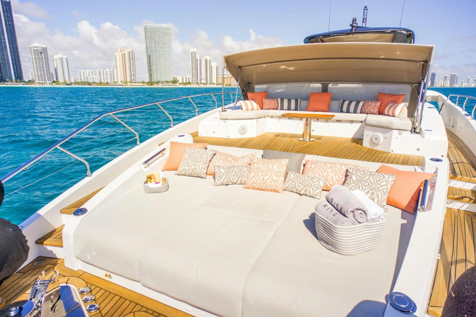 a boat with a large wooden deck aboard RINA Yacht for Sale