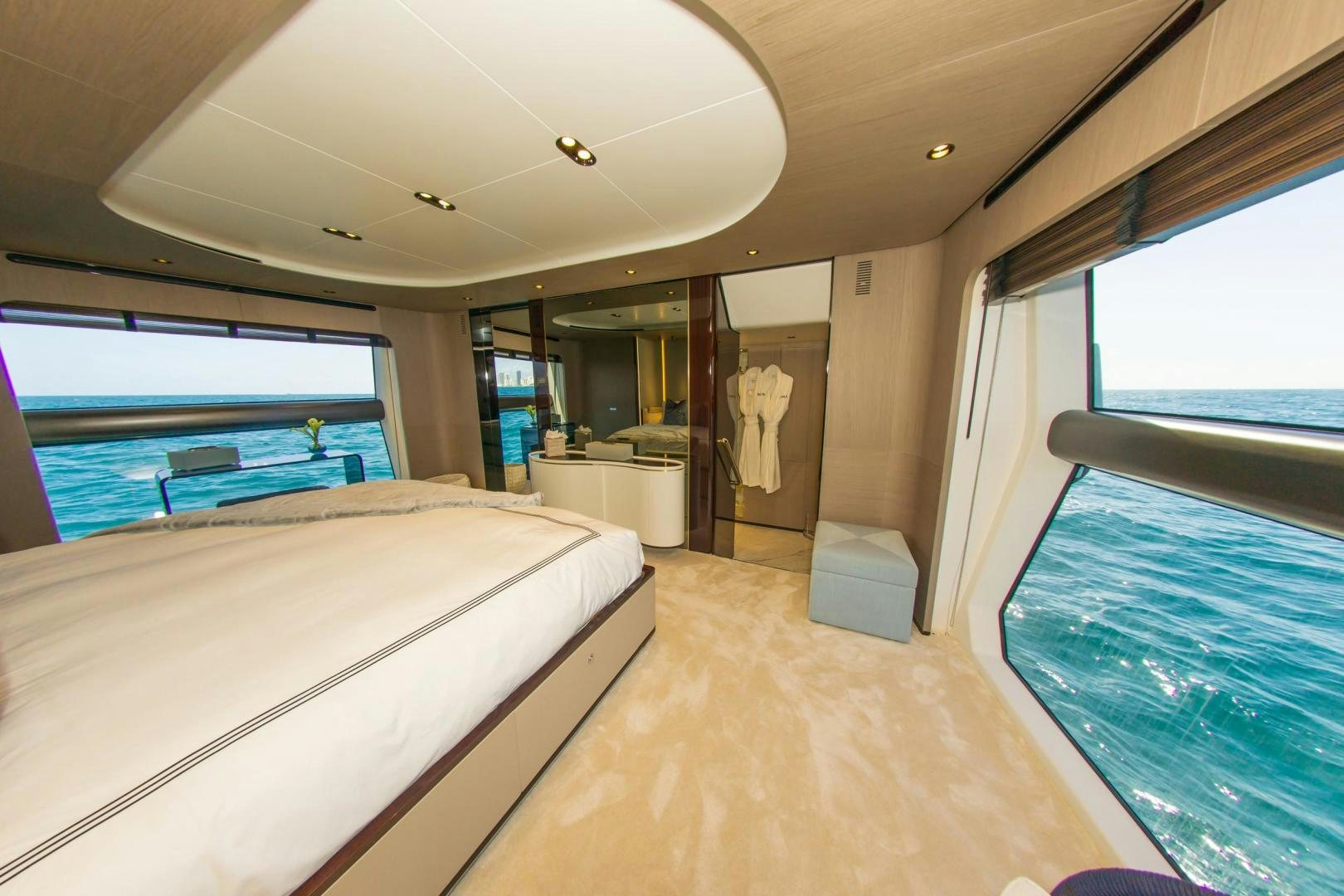 a room with a bed and a pool aboard RINA Yacht for Sale