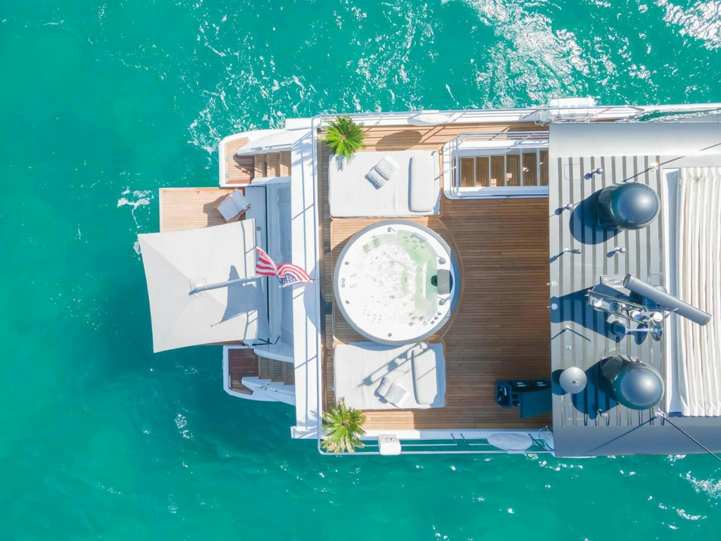 a house with a yard and trees aboard RINA Yacht for Sale