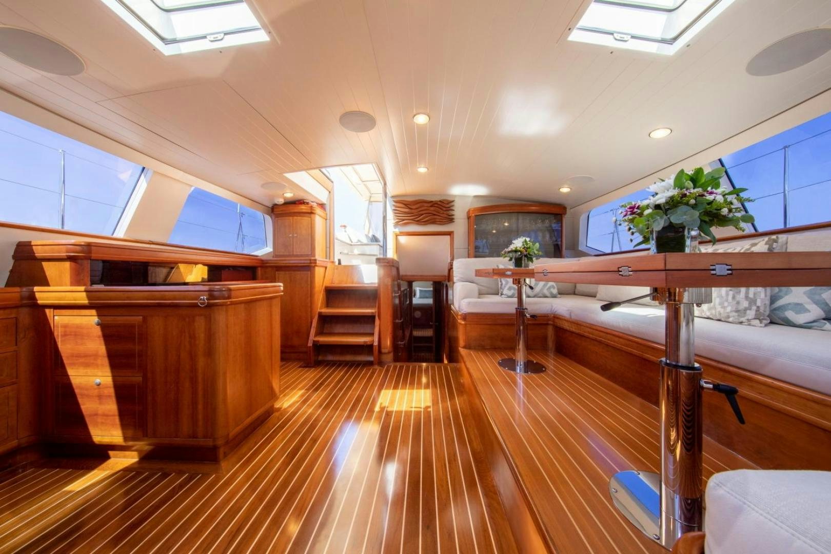 a room with a wood floor and a wood floor aboard WAVELENGTH Yacht for Sale