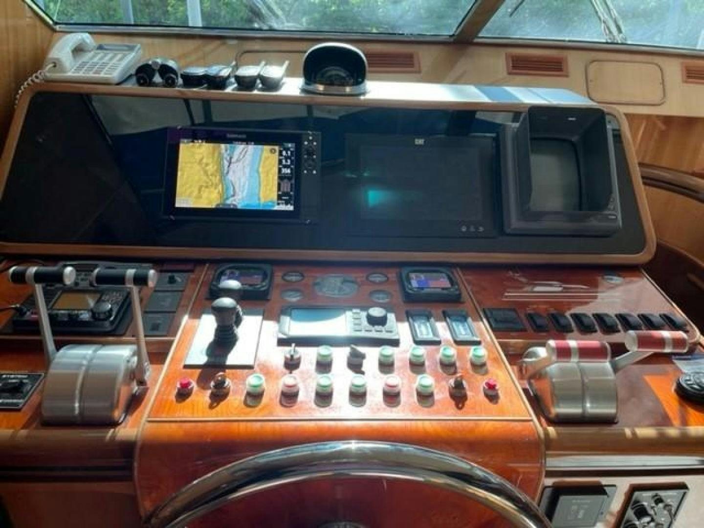 a brown and black electronic device aboard BALOZI Yacht for Sale