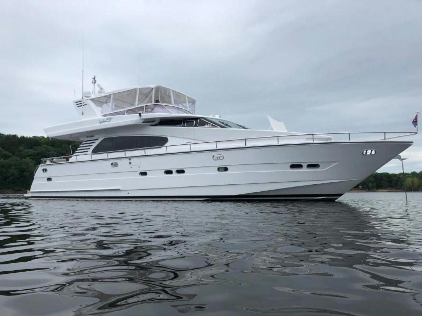 a white yacht in the water aboard BALOZI Yacht for Sale