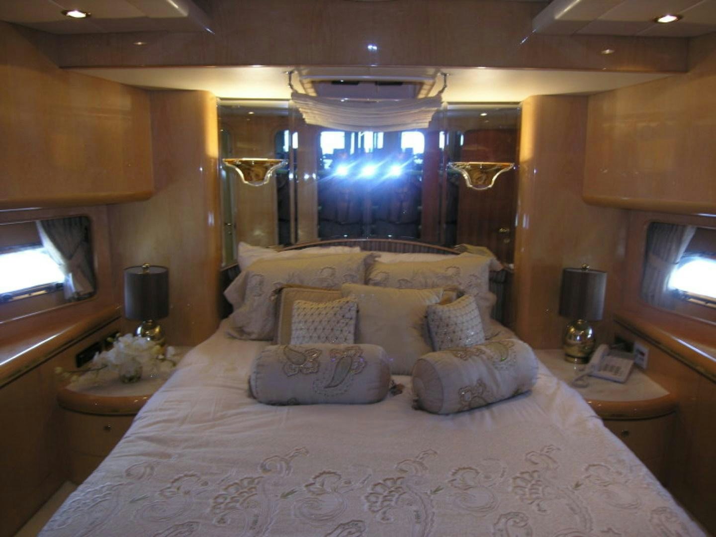 a bed with pillows and pillows aboard BALOZI Yacht for Sale