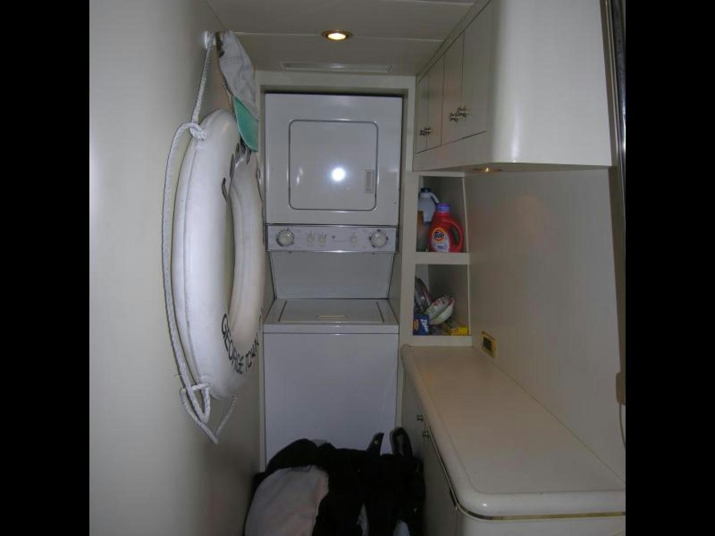 a white machine in a room aboard BALOZI Yacht for Sale