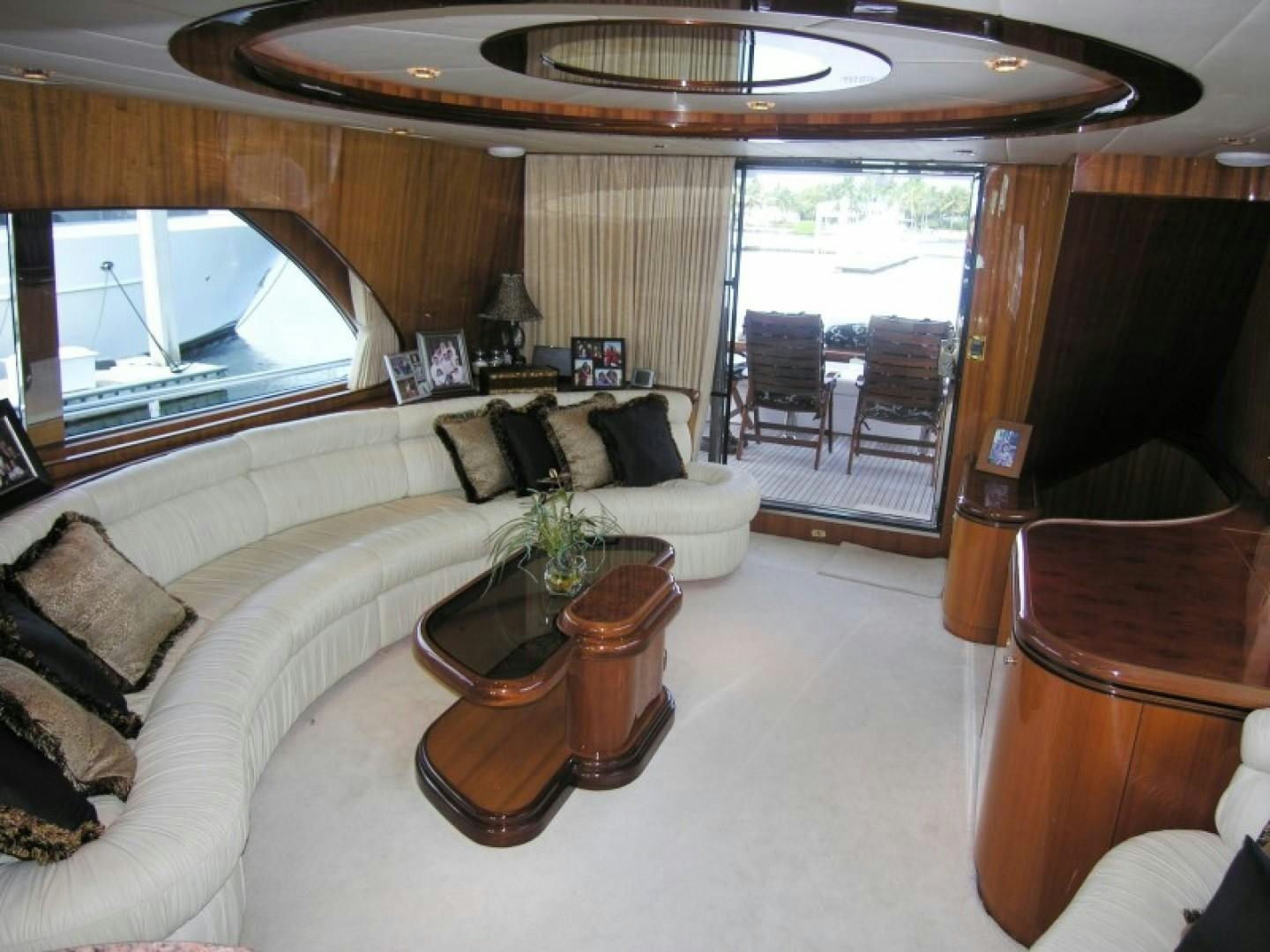 a living room with a large window aboard BALOZI Yacht for Sale