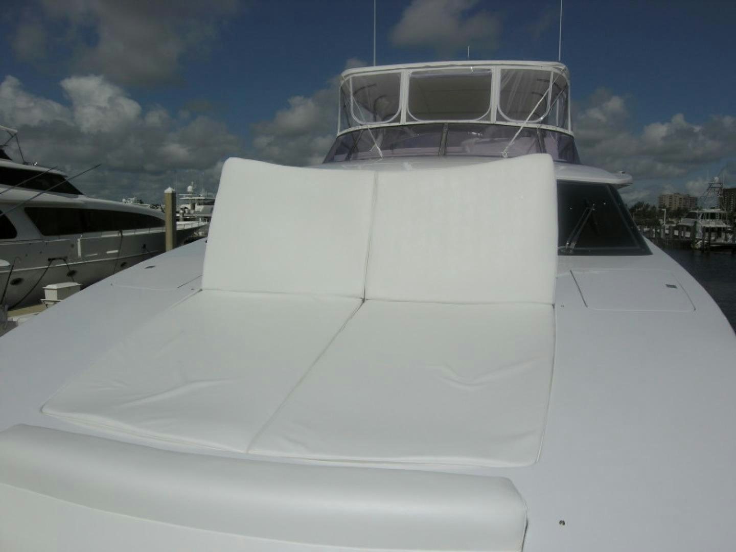 a white boat with a white roof aboard BALOZI Yacht for Sale